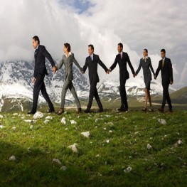 Business People Holding Hands and Walking --- Image by © moodboard/Corbis